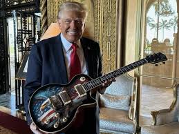 'Unsurpassed in grifting': Trump's newest merch release stuns onlookers ... - trump guitar manufacturer