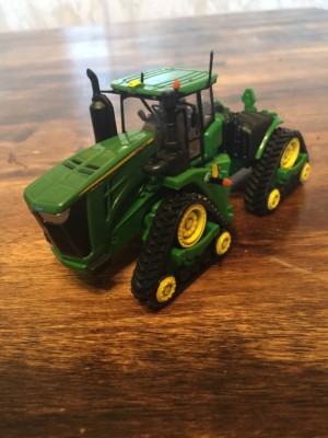 A relevant stock photo of 1 64 scale farm toys custom in a typical setting.