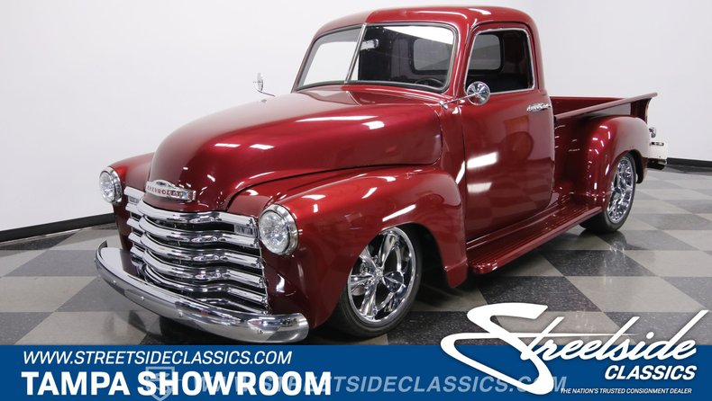 A relevant stock photo of 1951 chevy truck custom in a typical setting.