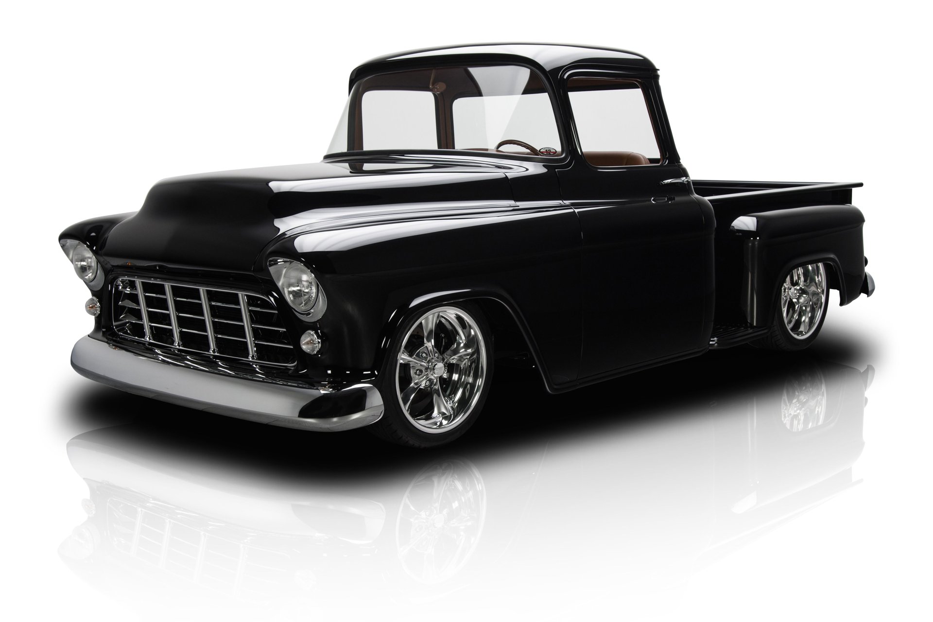 A relevant stock photo of 1955 chevy truck custom in a typical setting.