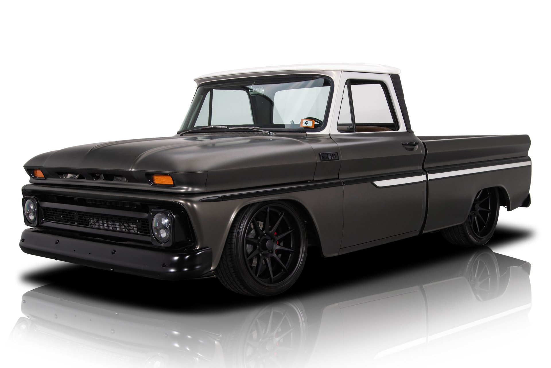 A relevant stock photo of 1965 chevy truck custom in a typical setting.