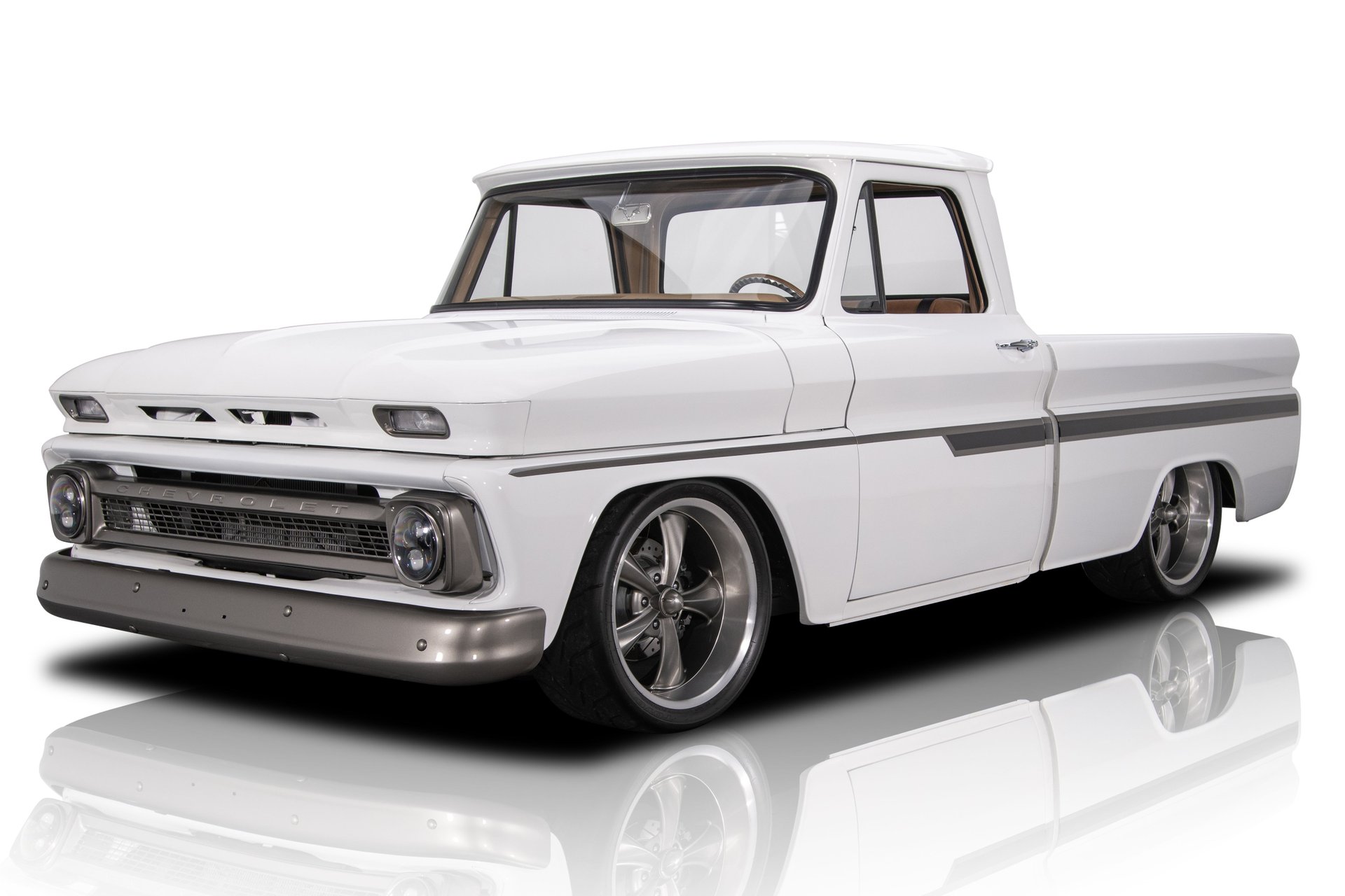 A relevant stock photo of 1966 chevy truck custom in a typical setting.