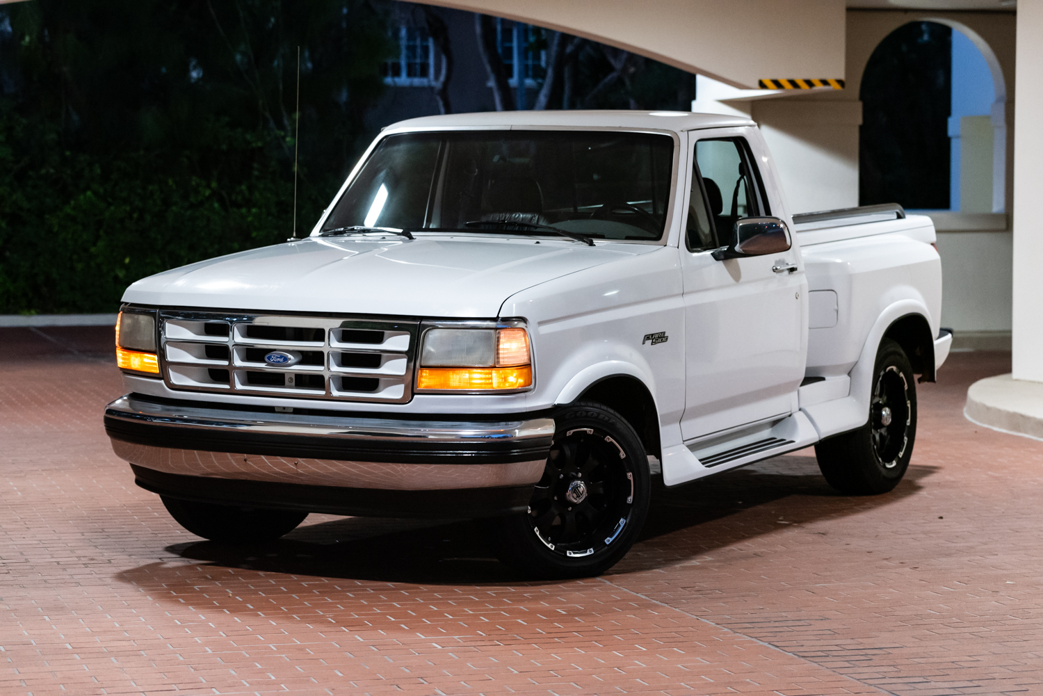 A relevant stock photo of 1994 ford f150 custom in a typical setting.
