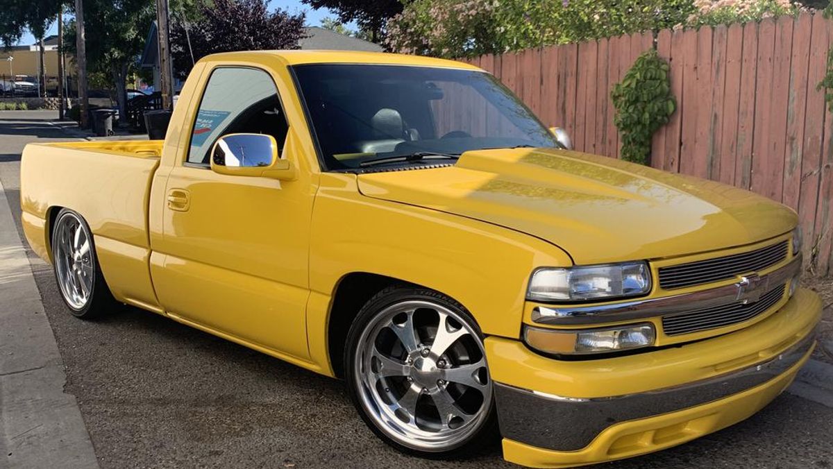 A relevant stock photo of 2002 chevy silverado 1500 custom in a typical setting.
