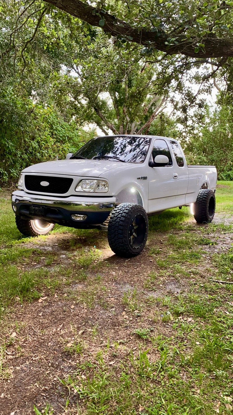 A relevant stock photo of 2002 ford f150 custom in a typical setting.