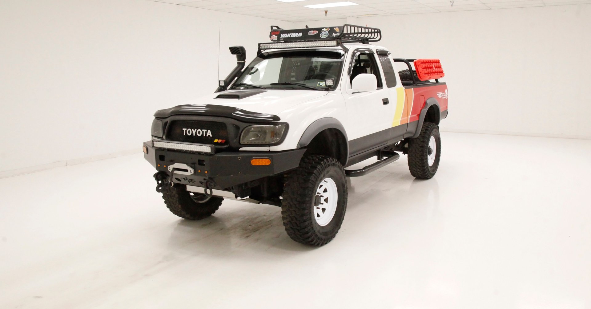 A relevant stock photo of 2002 toyota tacoma custom in a typical setting.