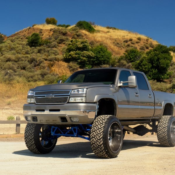 A relevant stock photo of 2003 chevy silverado custom in a typical setting.