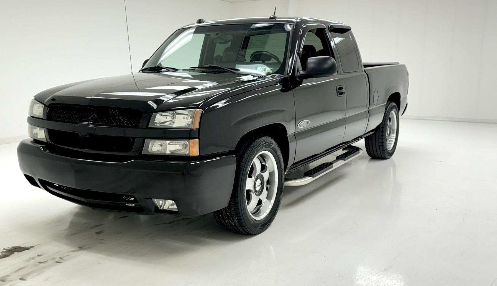 A relevant stock photo of 2004 chevy silverado custom in a typical setting.