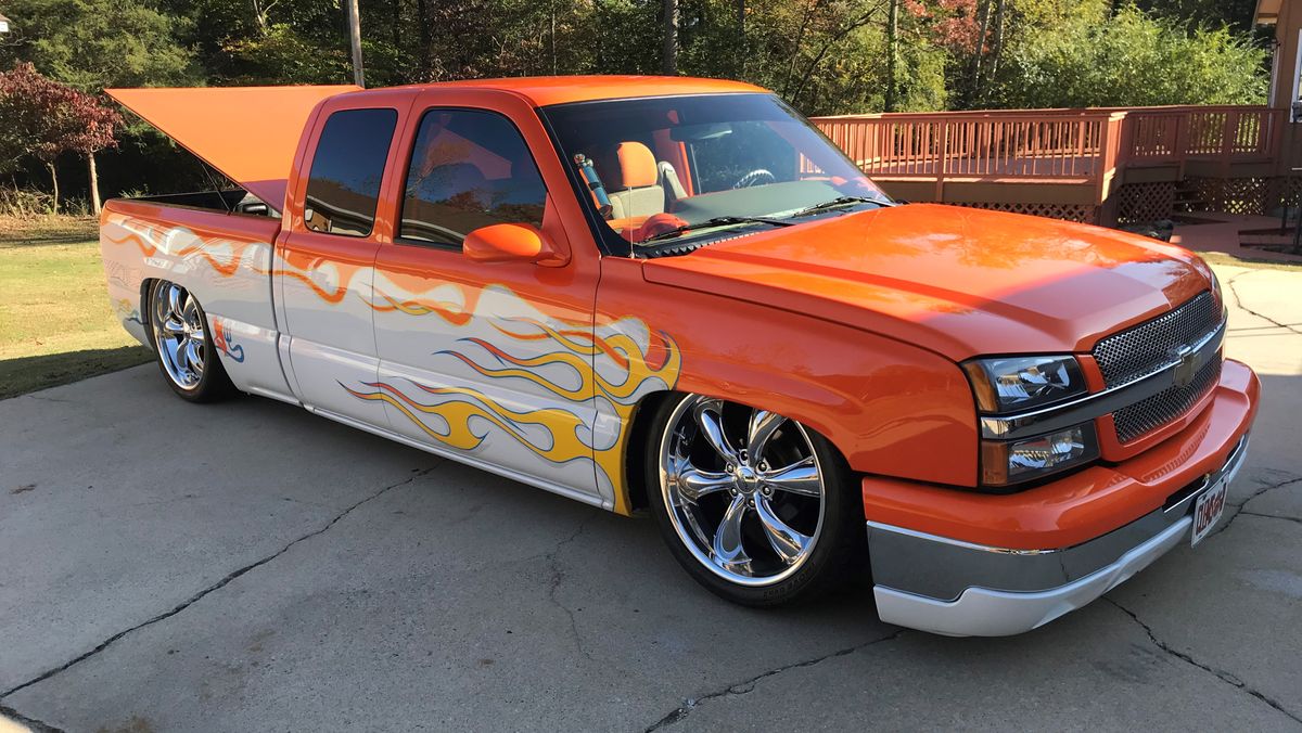 A relevant stock photo of 2004 chevy silverado custom in a typical setting.