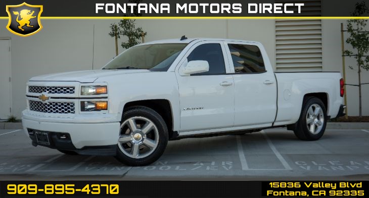 A relevant stock photo of 2014 silverado custom in a typical setting.