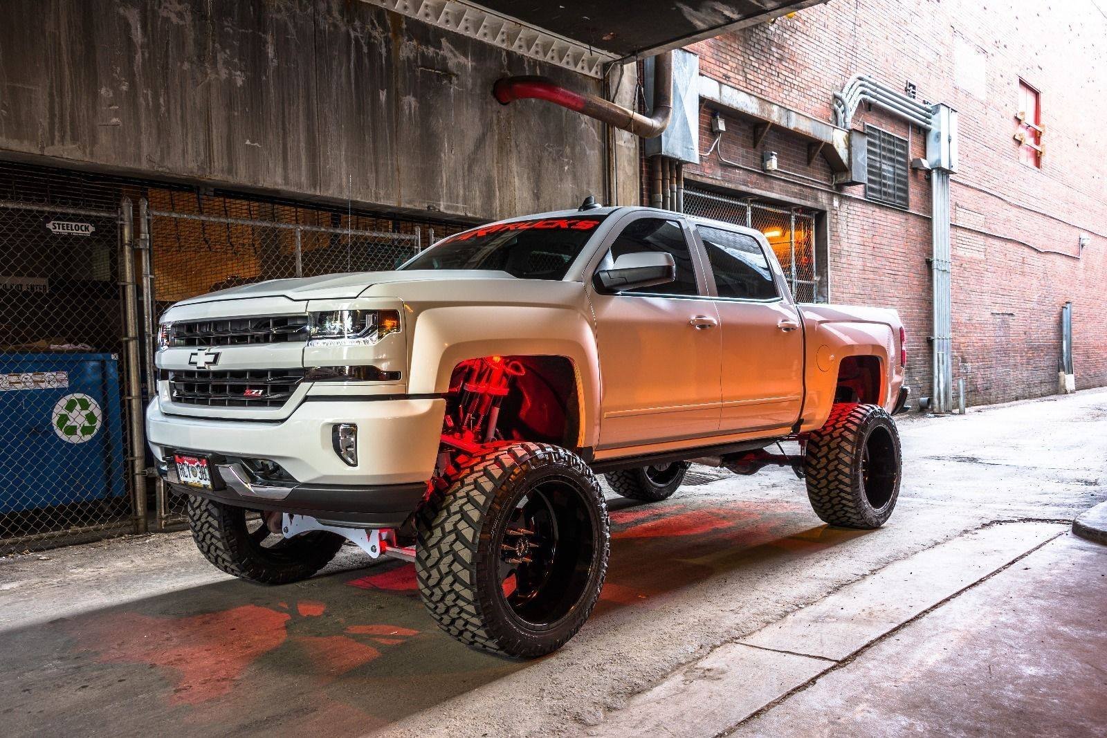 A relevant stock photo of 2016 chevy silverado custom in a typical setting.
