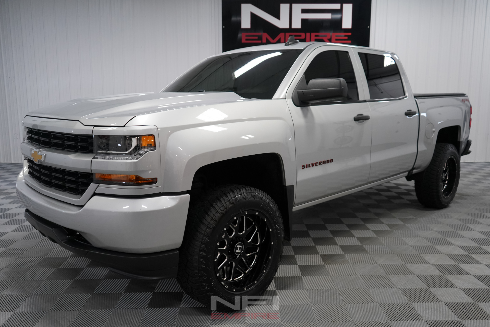 A relevant stock photo of 2018 chevy silverado custom in a typical setting.