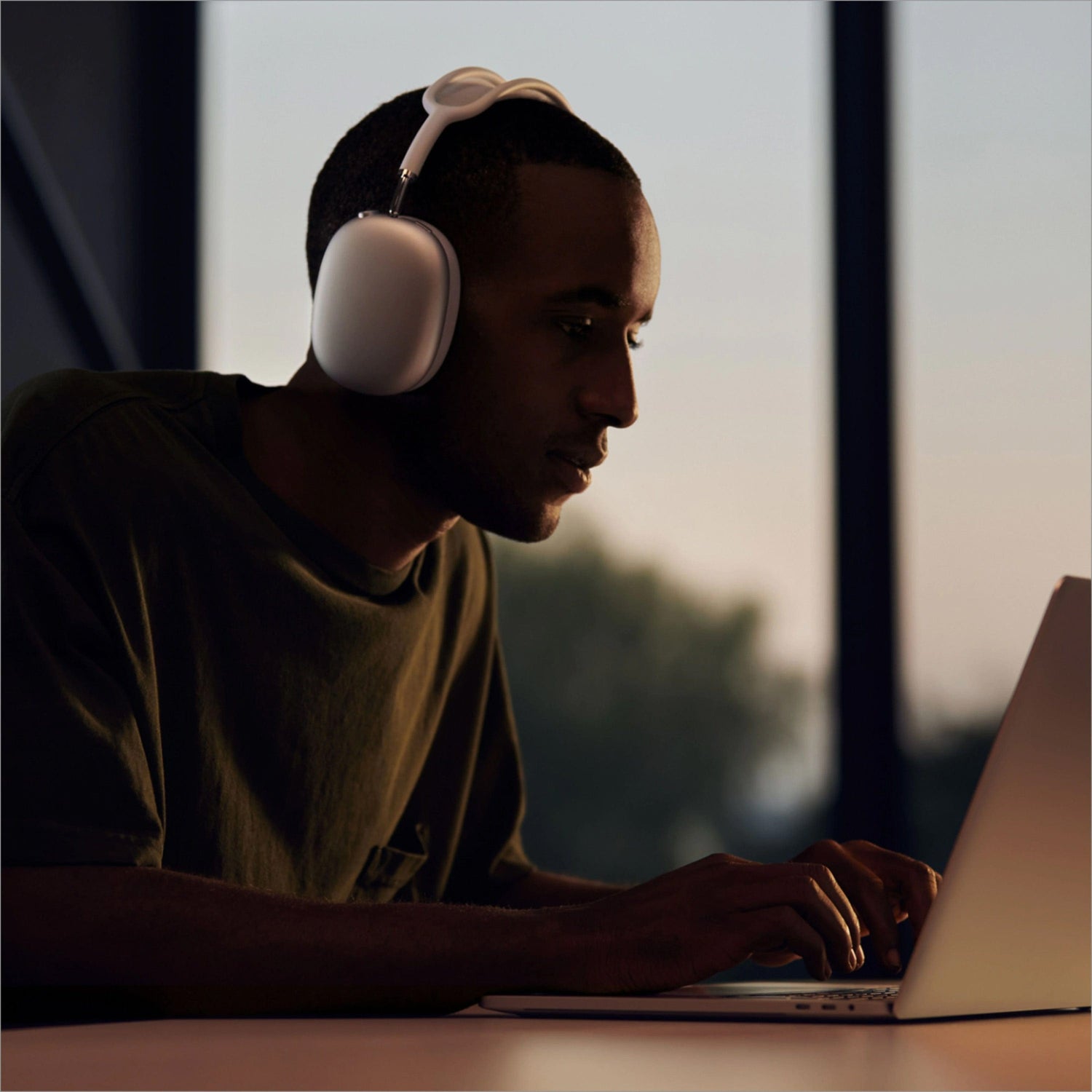 A relevant stock photo of apple headphones custom in a typical setting.
