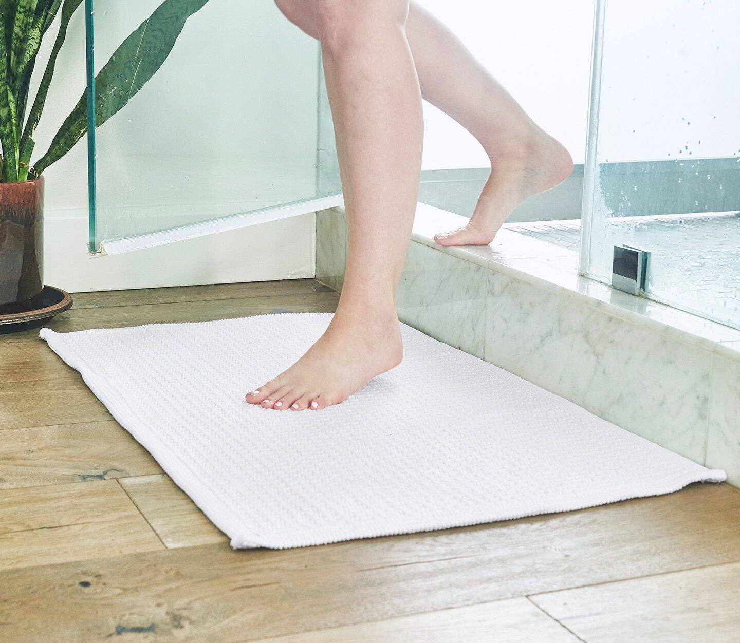 A relevant stock photo of bath mat manufacturer in a typical setting.