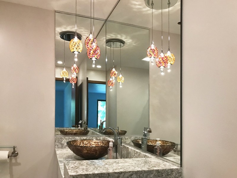 A relevant stock photo of bathroom mirror custom in a typical setting.