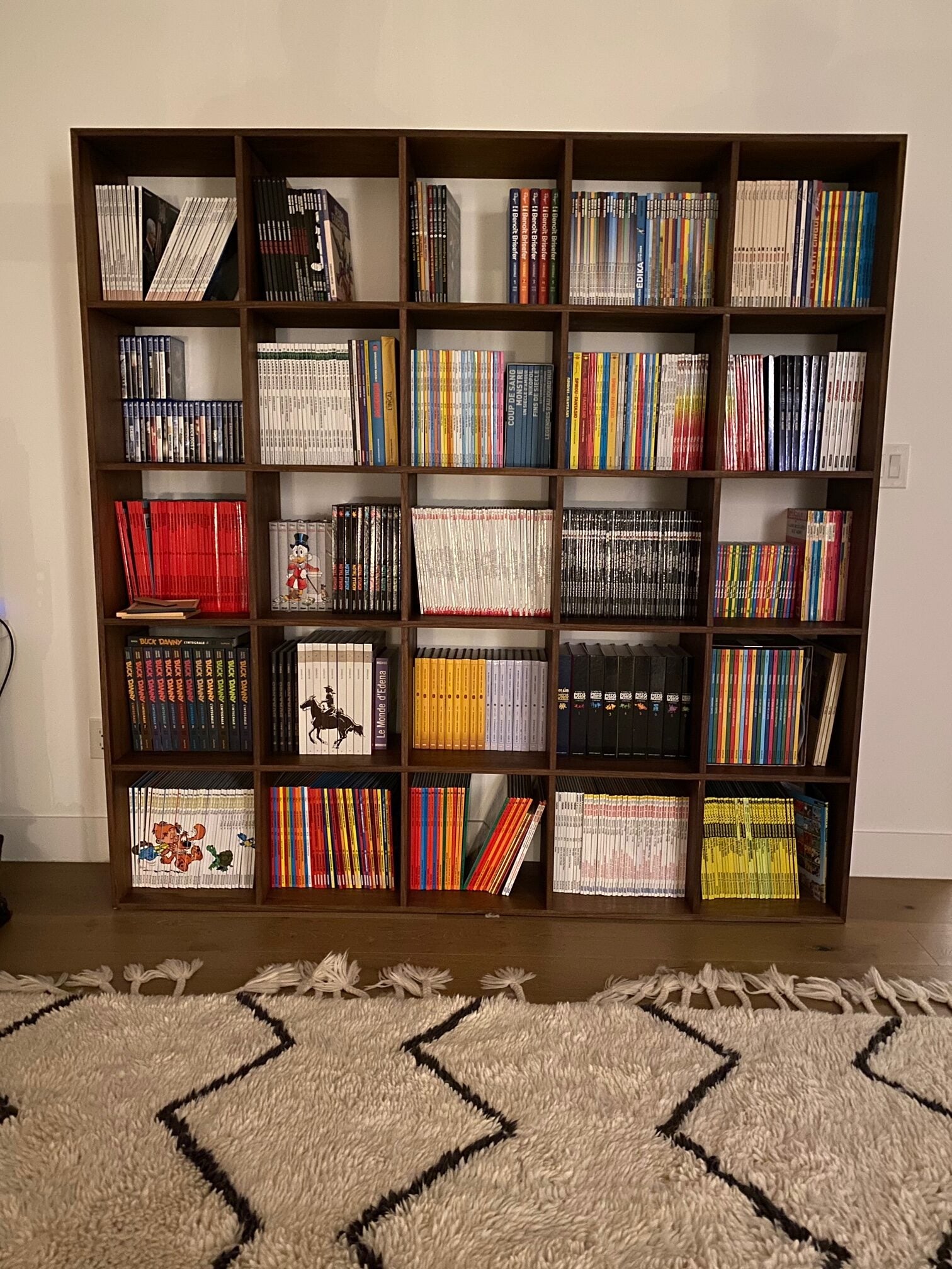 A relevant stock photo of bookcase custom in a typical setting.