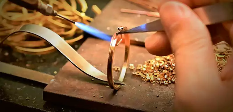 A relevant stock photo of brass jewelry manufacturer in a typical setting.