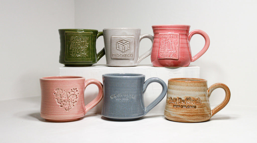 A relevant stock photo of ceramic mugs custom in a typical setting.