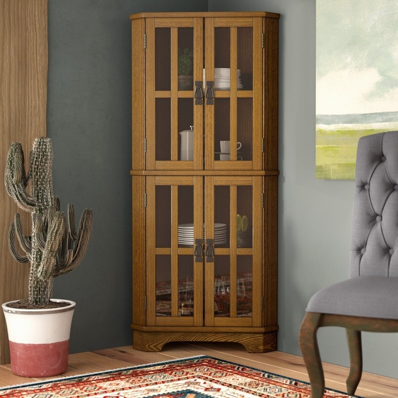 A relevant stock photo of corner cabinet china in a typical setting.