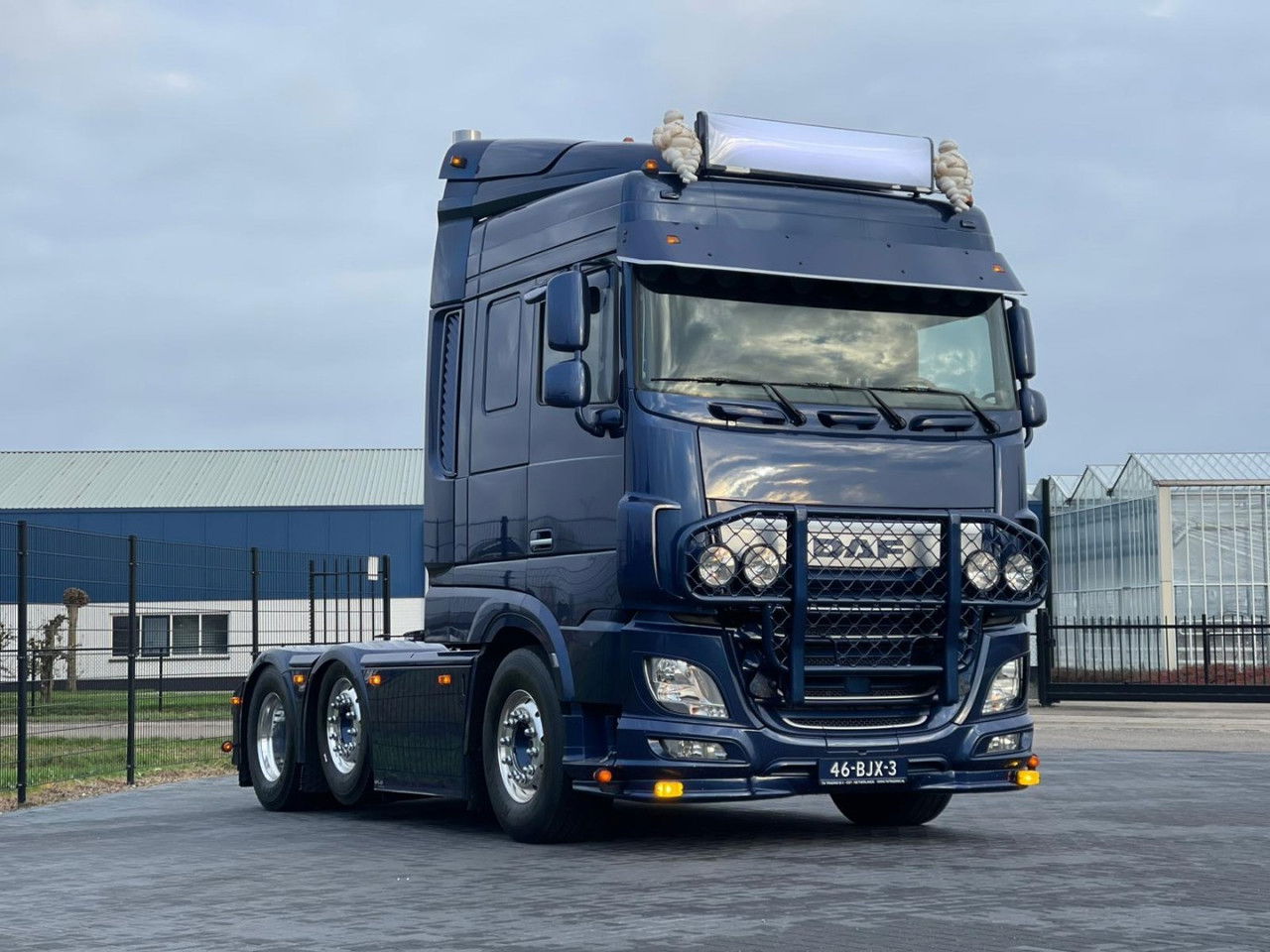 A relevant stock photo of daf xf custom in a typical setting.