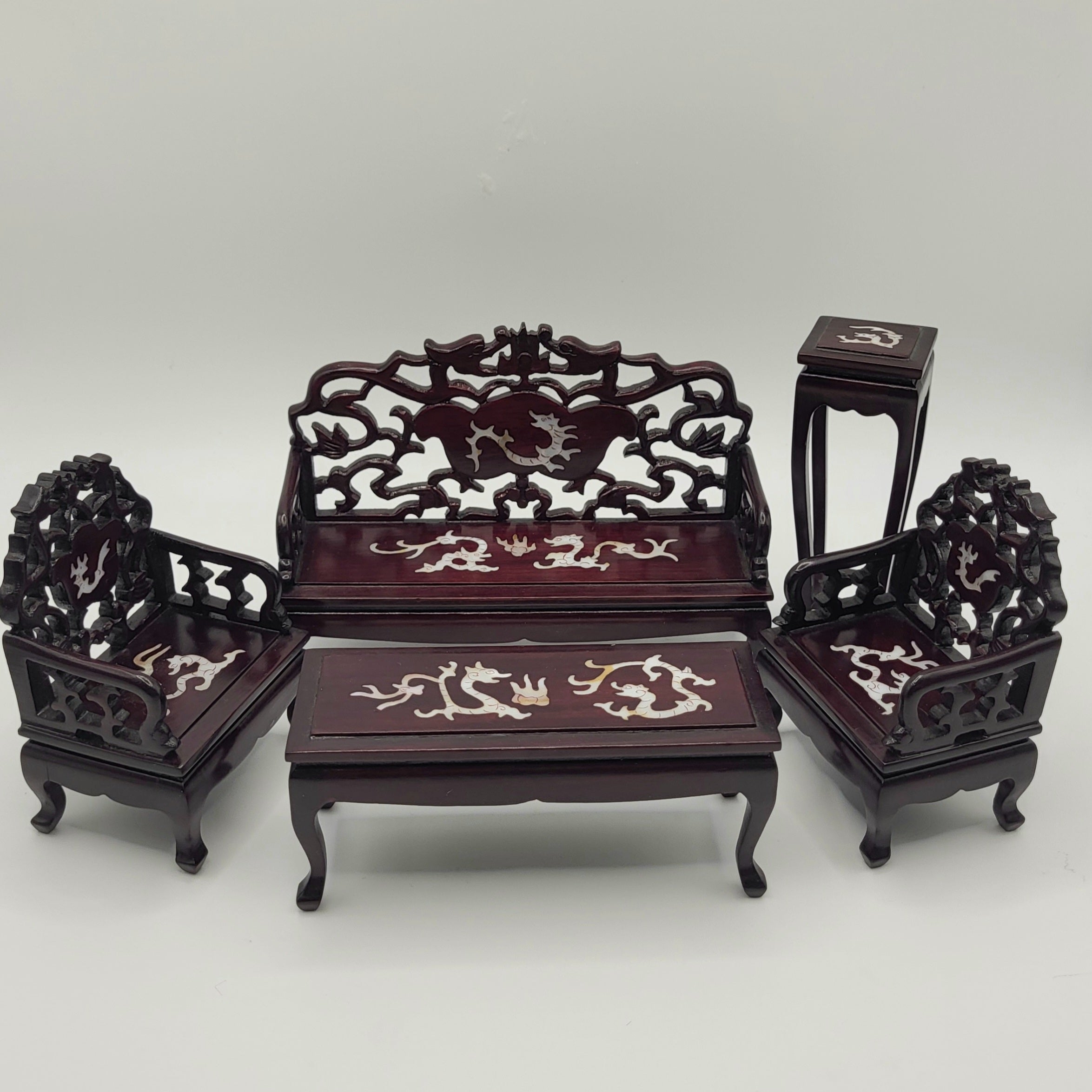 A relevant stock photo of dollhouse furniture china in a typical setting.