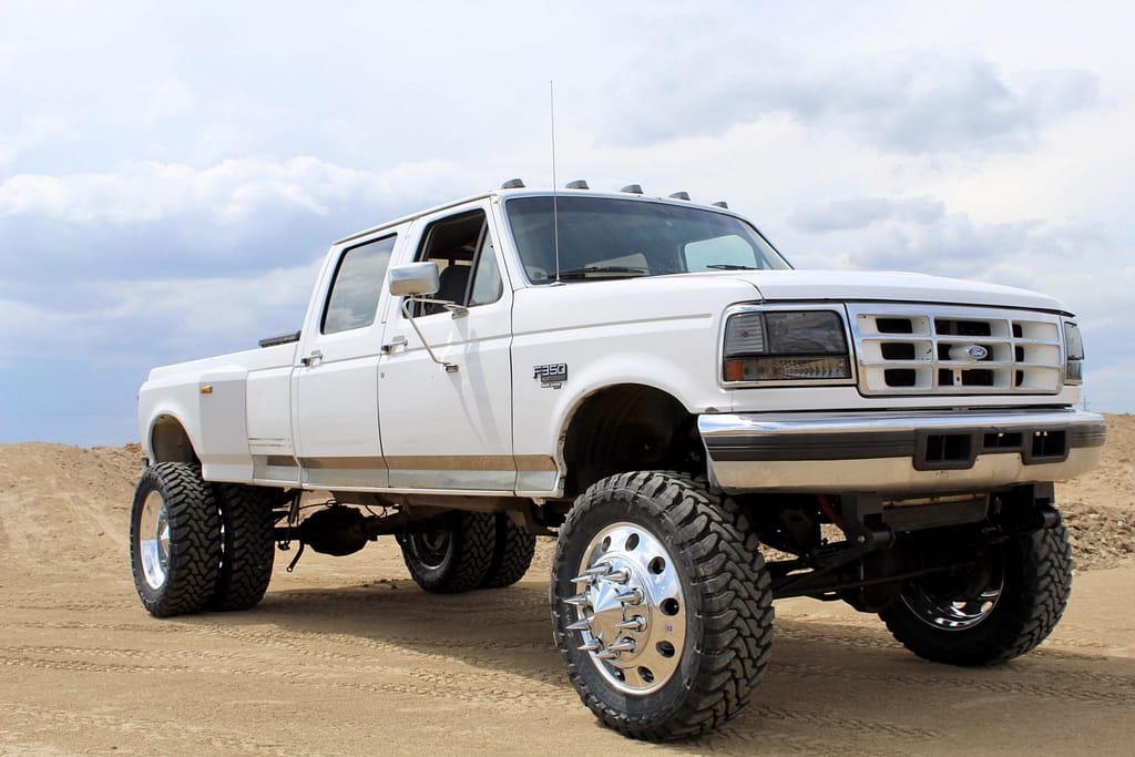 A relevant stock photo of dually truck custom in a typical setting.