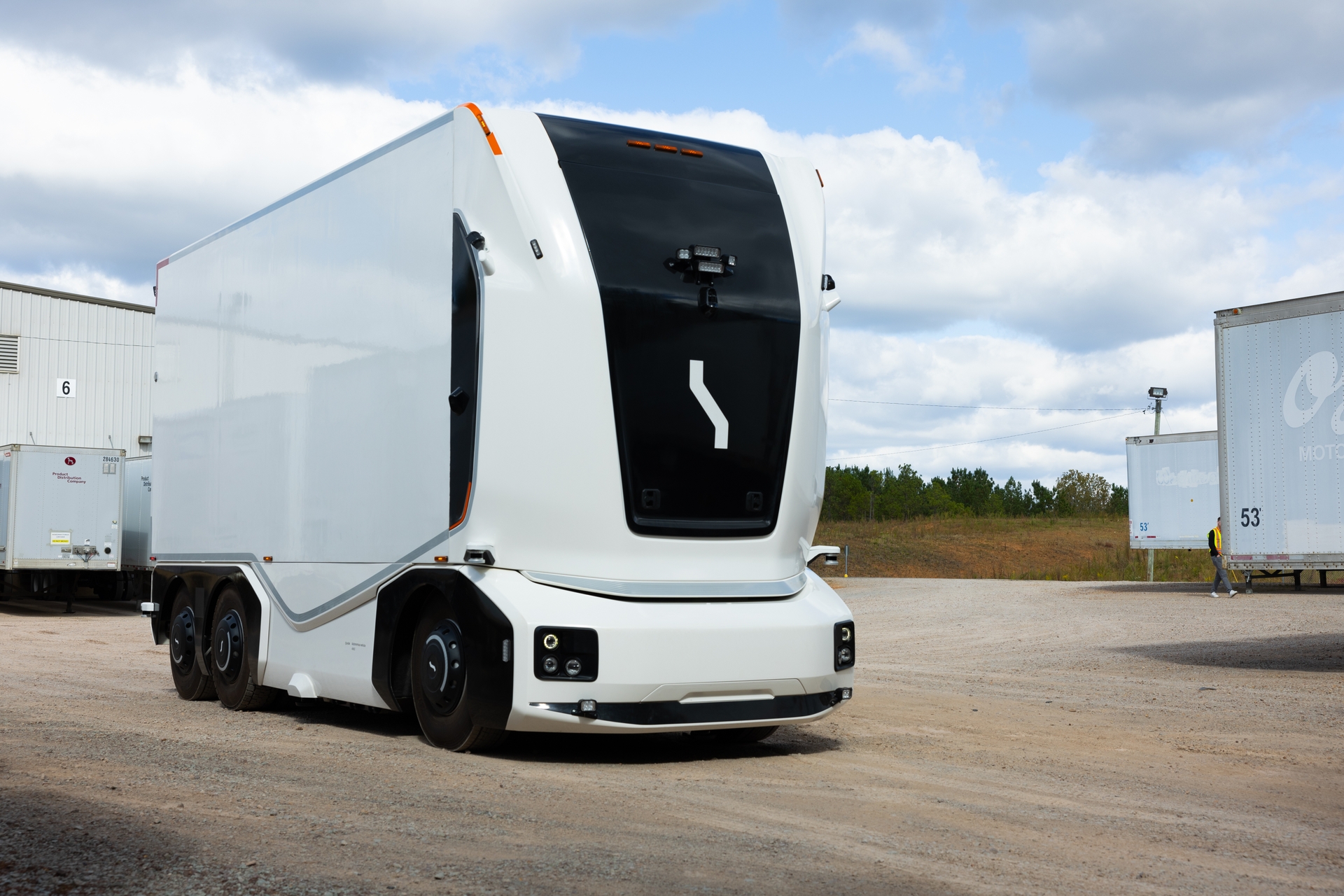 A relevant stock photo of electric truck manufacturer in a typical setting.