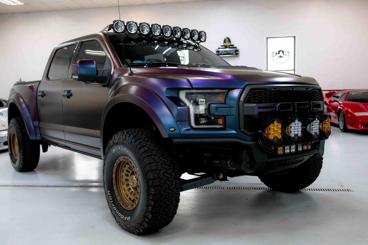 A relevant stock photo of f150 raptor custom in a typical setting.