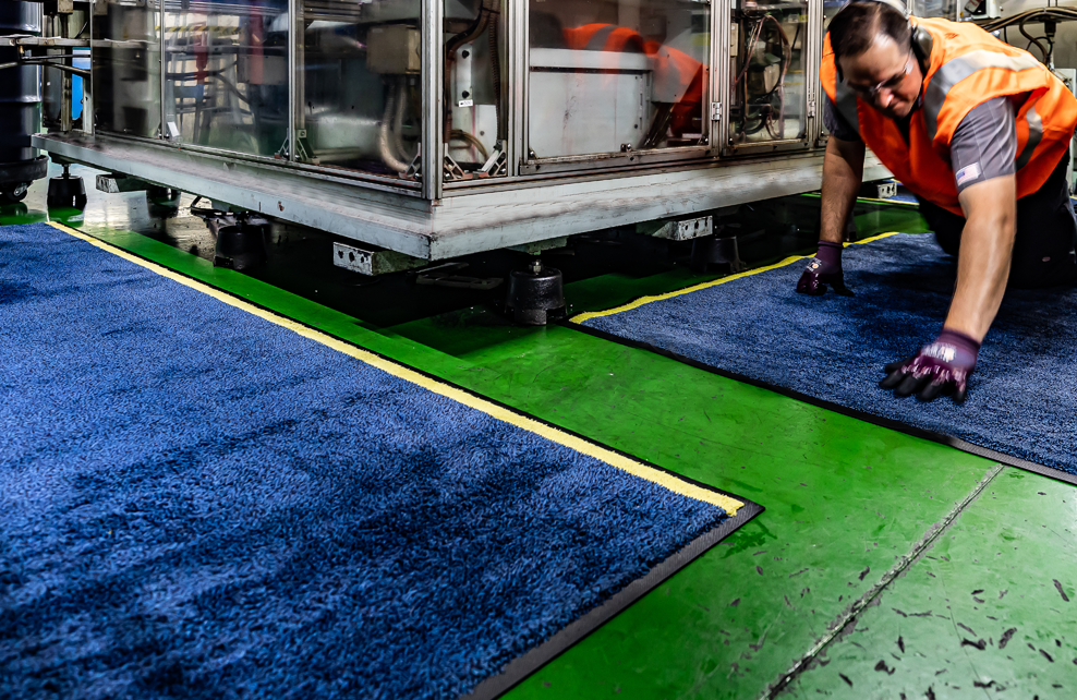 A relevant stock photo of floor mat manufacturer in a typical setting.