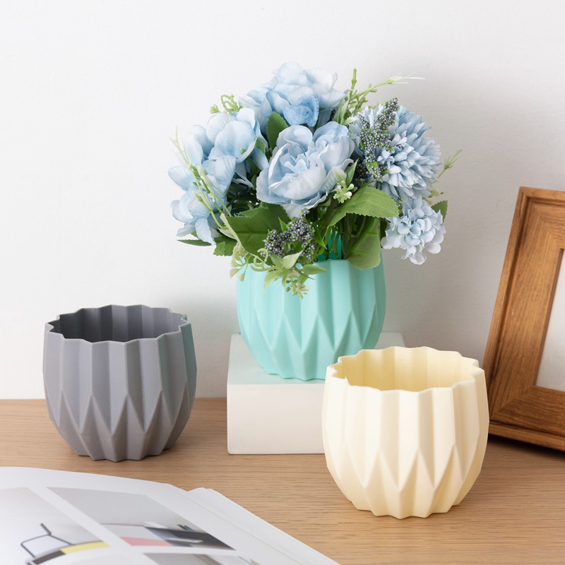 A relevant stock photo of flower pot manufacturer in a typical setting.