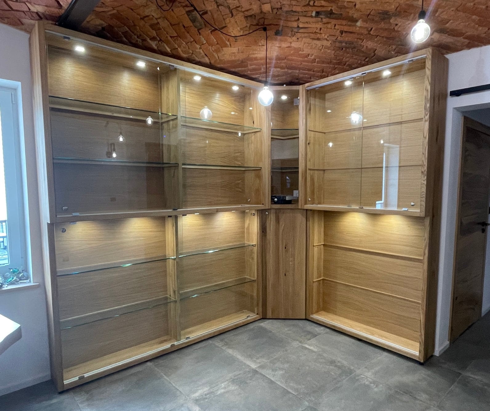 A relevant stock photo of glass display cabinet custom in a typical setting.