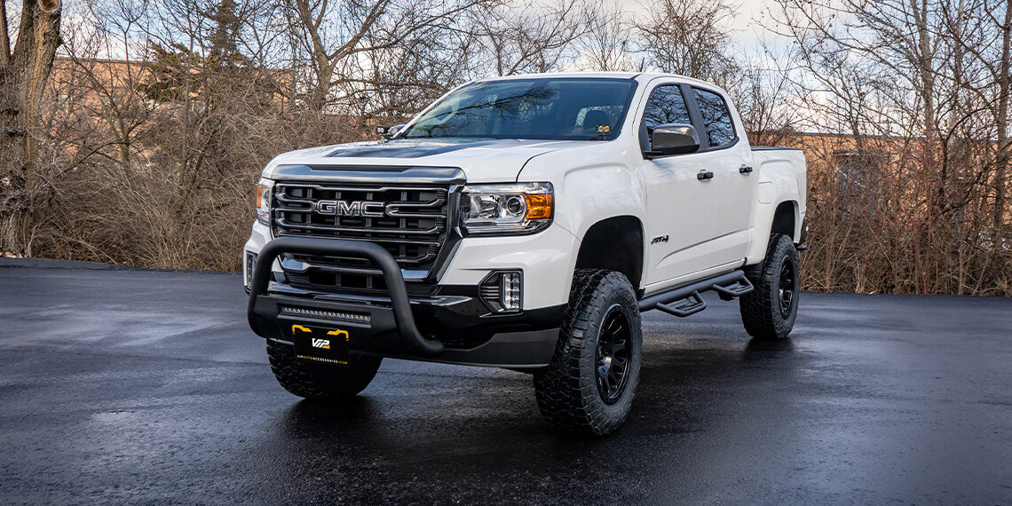 A relevant stock photo of gmc canyon at4 custom in a typical setting.