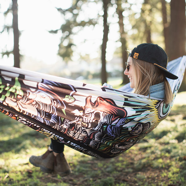 A relevant stock photo of hammock custom in a typical setting.