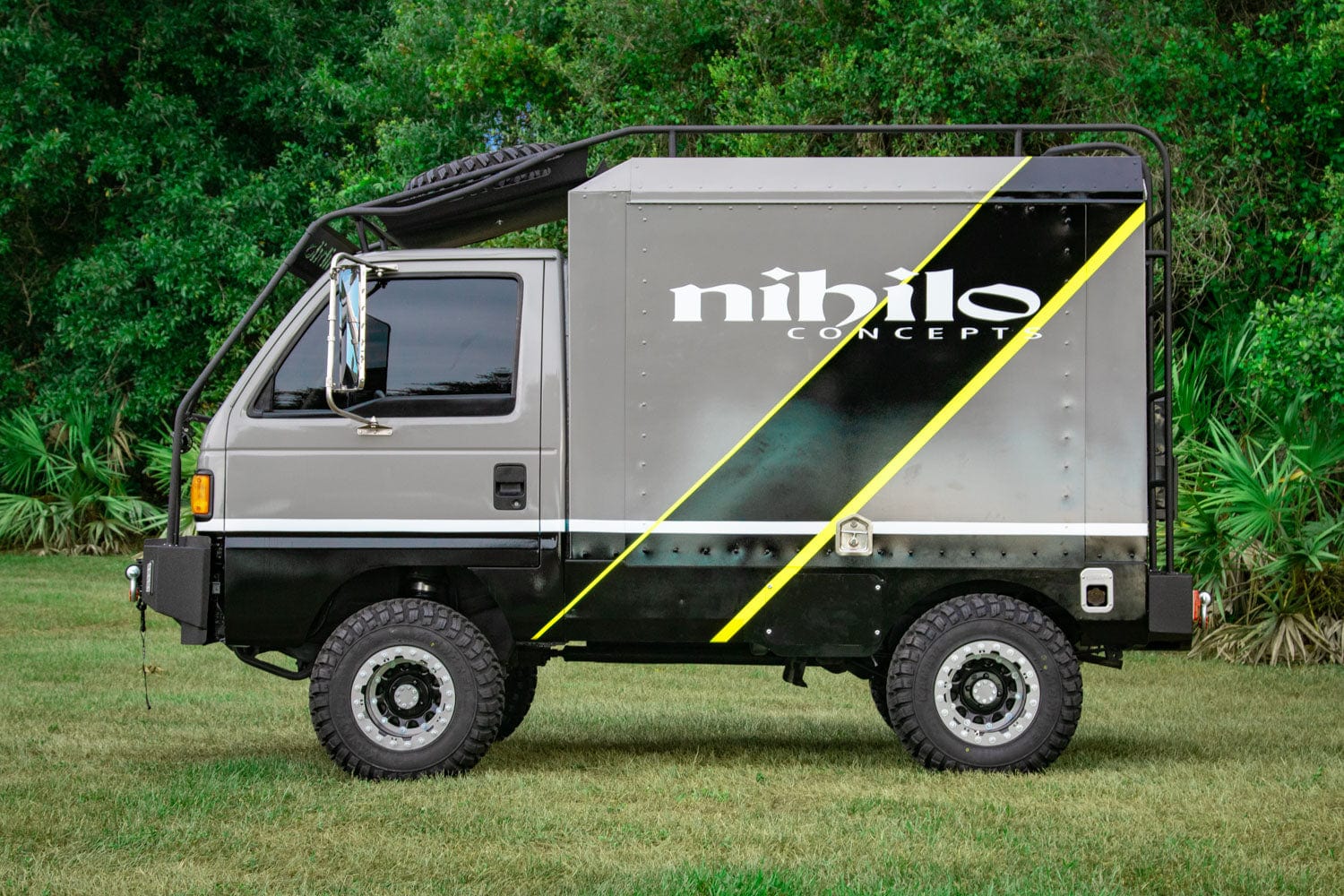 A relevant stock photo of honda mini truck custom in a typical setting.