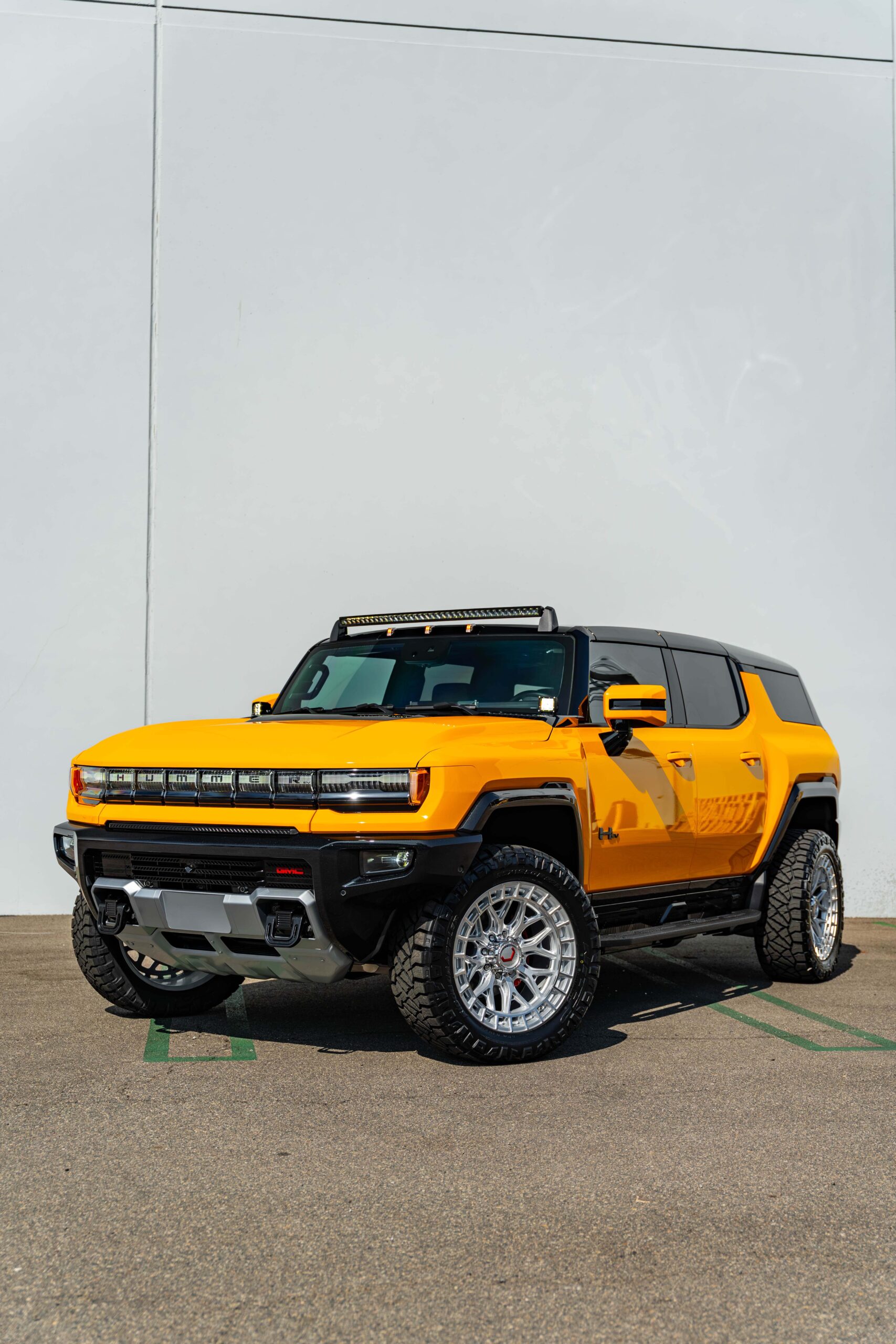 A relevant stock photo of hummer ev suv custom in a typical setting.