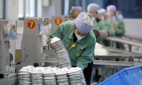 A relevant stock photo of mask manufacturer in a typical setting.