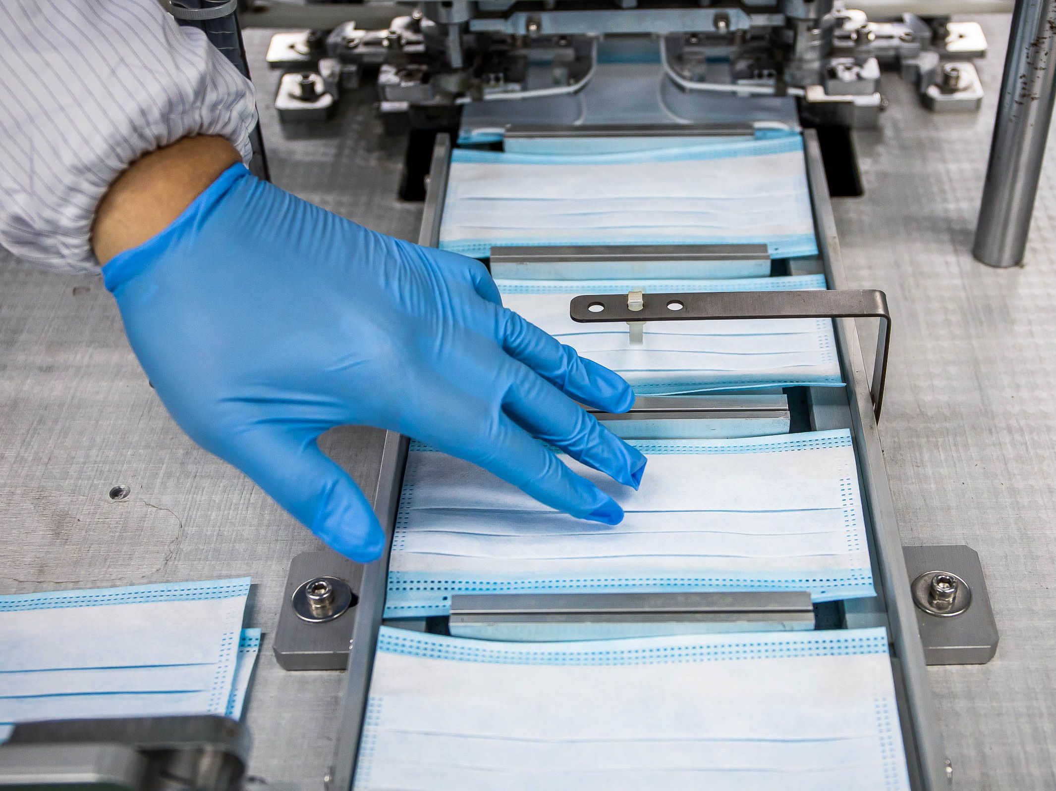 A relevant stock photo of mask manufacturer in a typical setting.