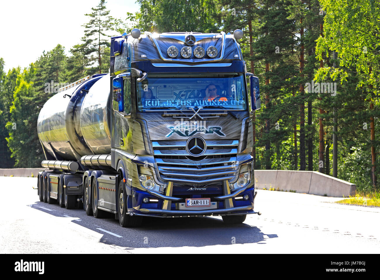 A relevant stock photo of mercedes actros custom in a typical setting.