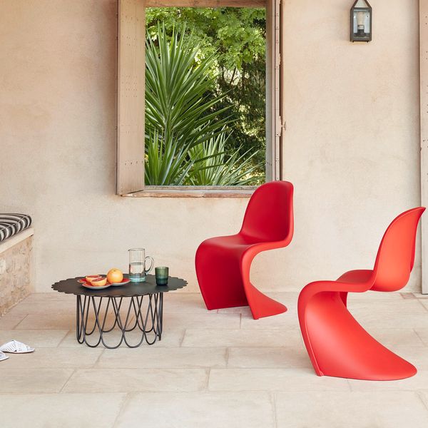 A relevant stock photo of panton chair china in a typical setting.