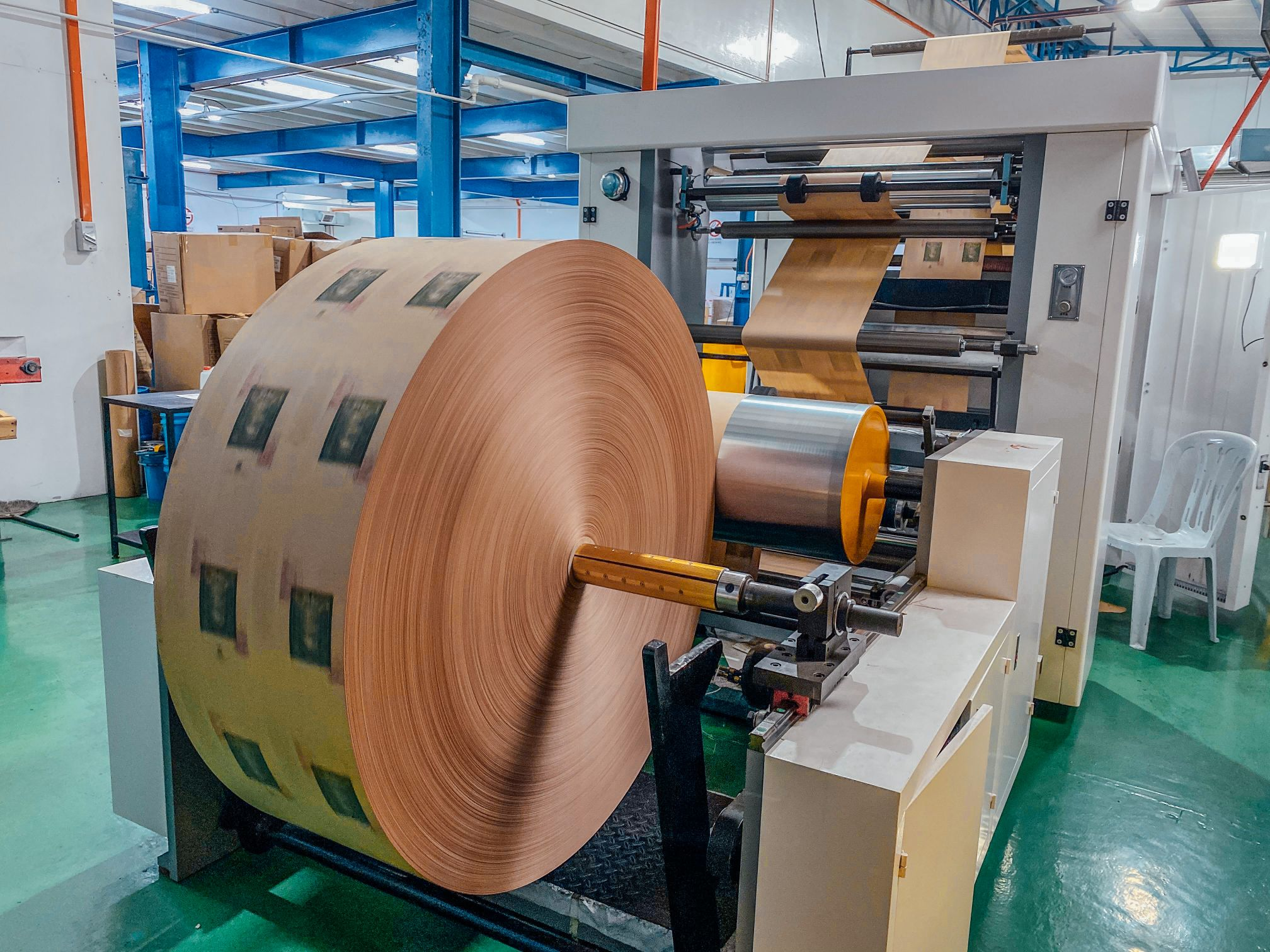 A relevant stock photo of paper bag manufacturer in a typical setting.