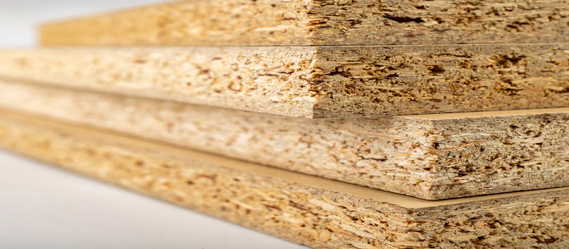 A relevant stock photo of particle board manufacturer in a typical setting.