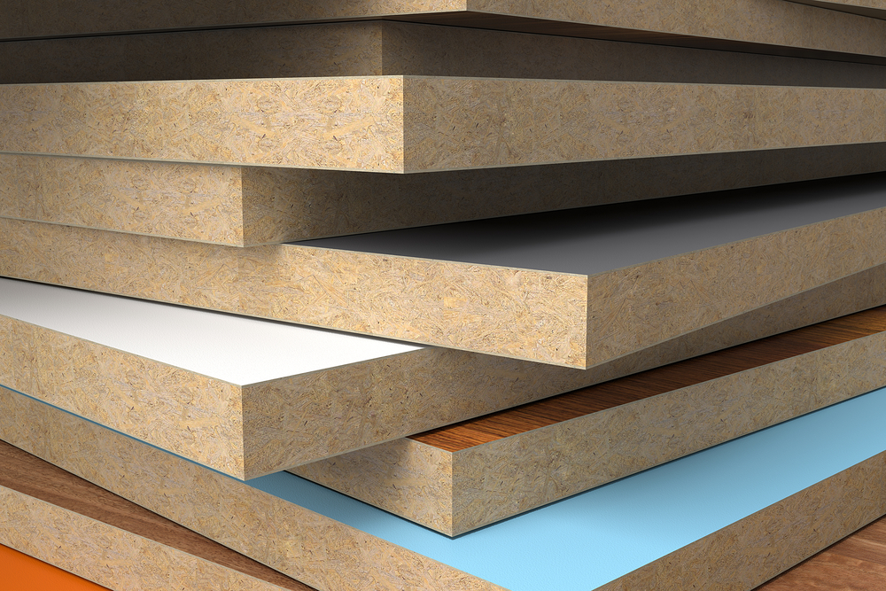 A relevant stock photo of particle board manufacturer in a typical setting.