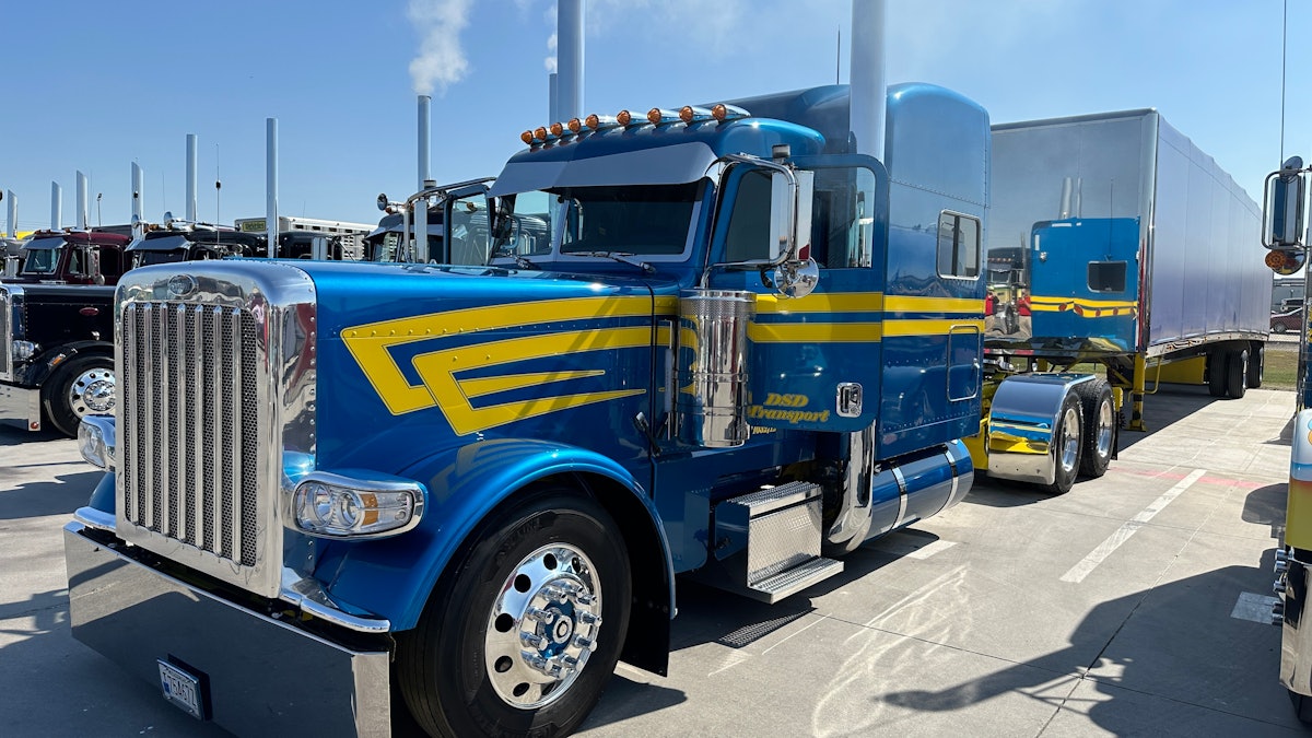 A relevant stock photo of peterbilt trucks custom in a typical setting.