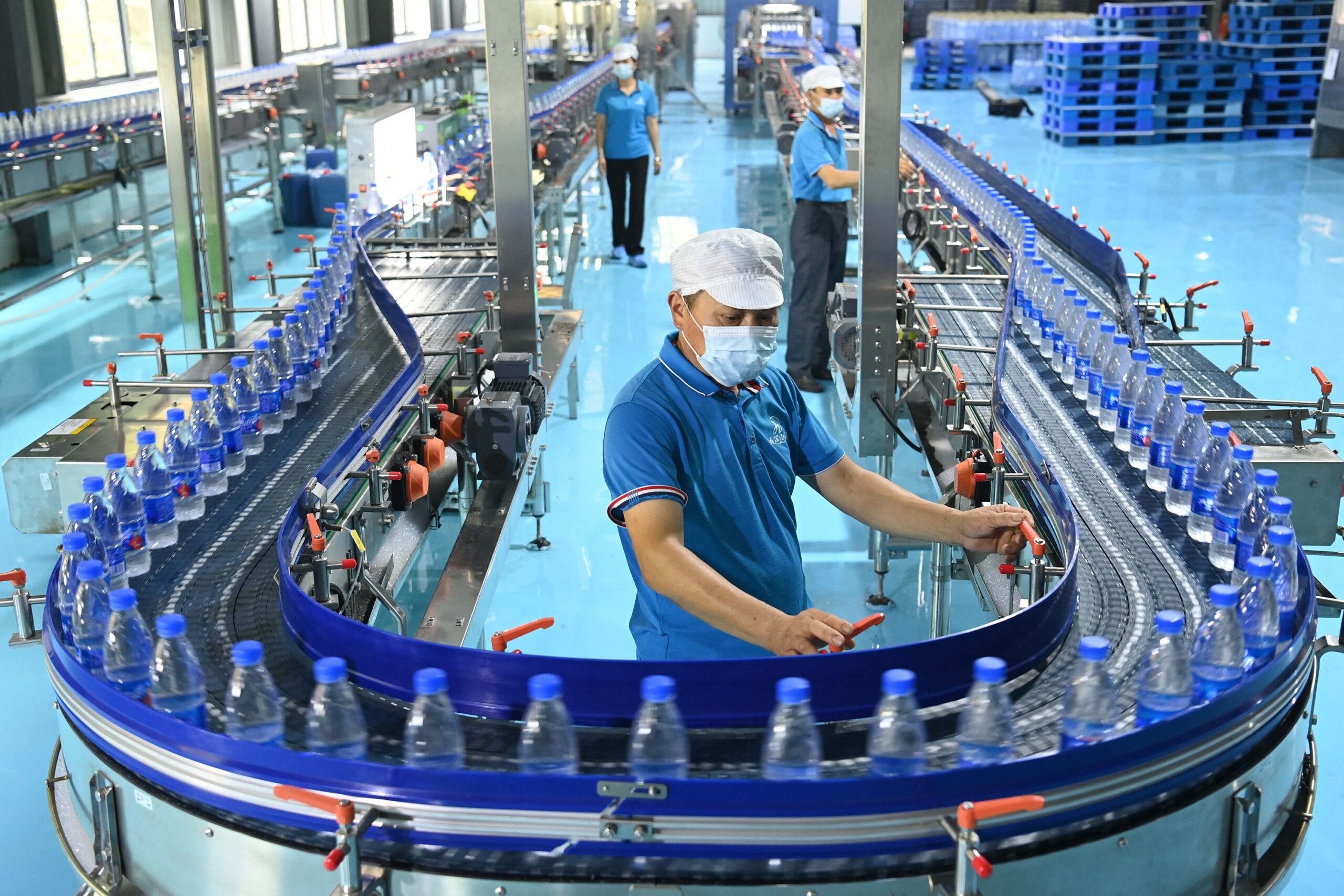 A relevant stock photo of plastic water bottle manufacturer in a typical setting.