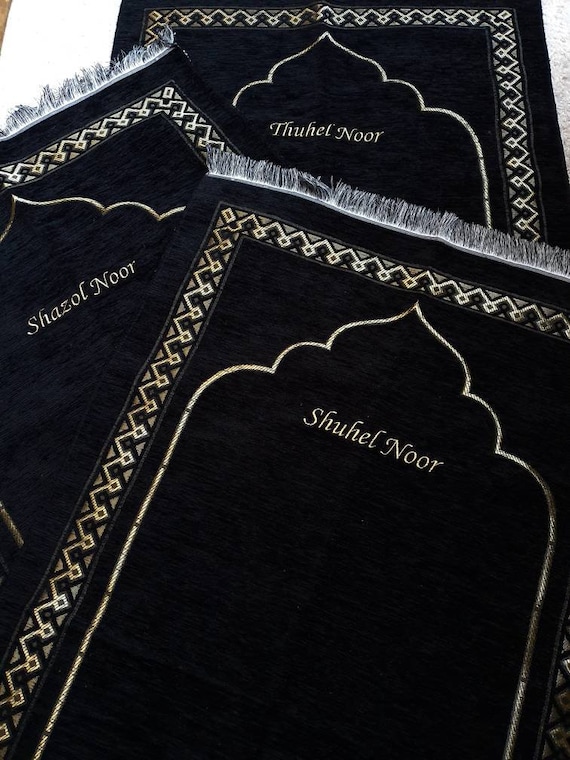A relevant stock photo of prayer mat custom in a typical setting.