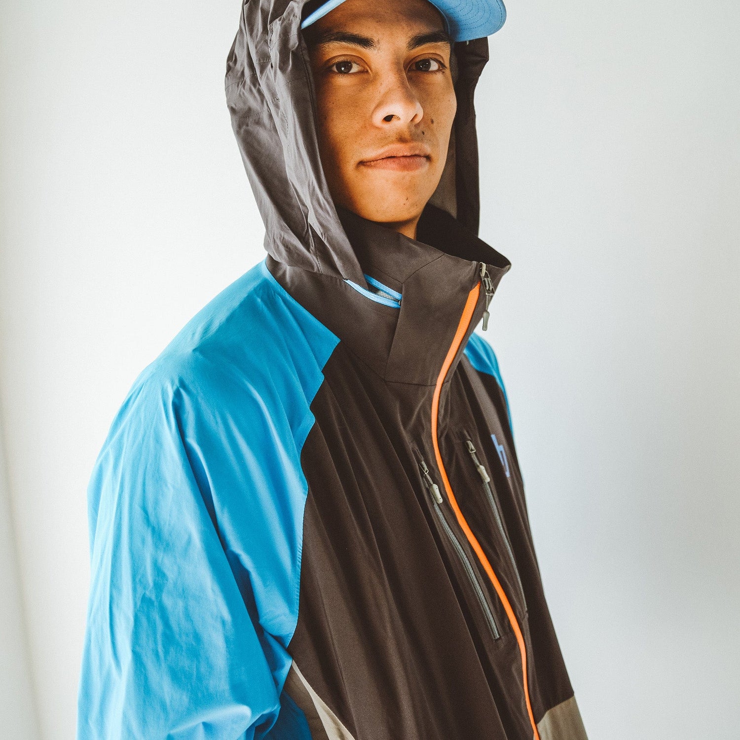 A relevant stock photo of rain jacket custom in a typical setting.
