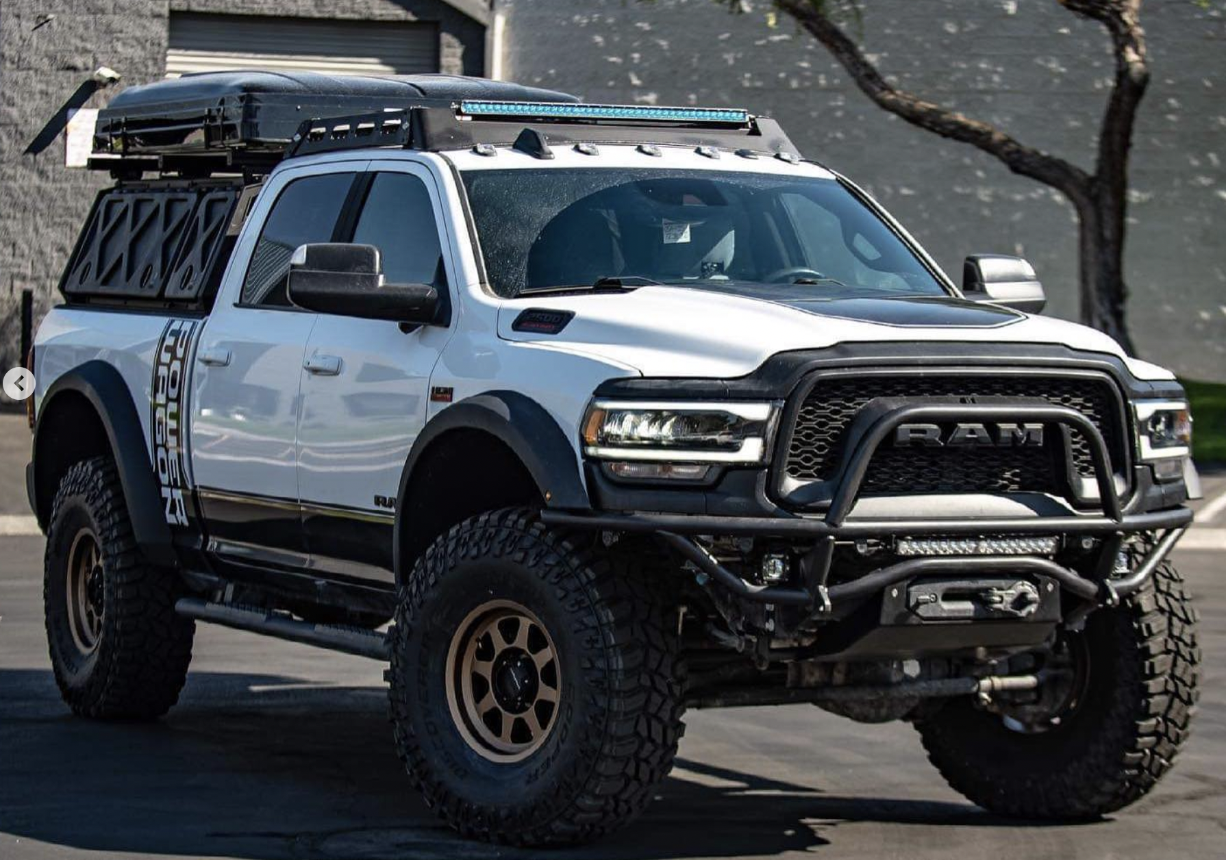 A relevant stock photo of ram power wagon custom in a typical setting.