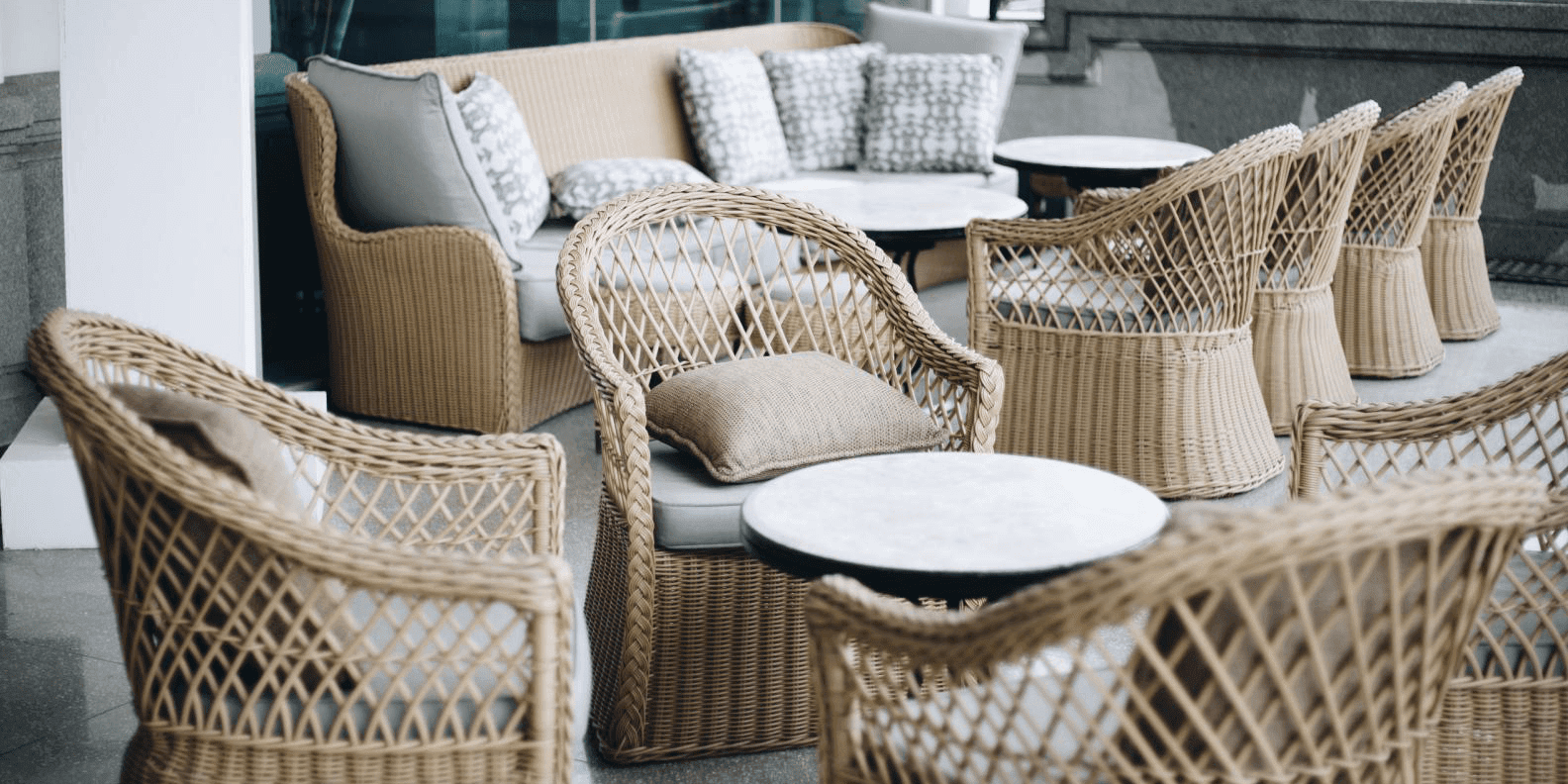 A relevant stock photo of rattan outdoor furniture china in a typical setting.