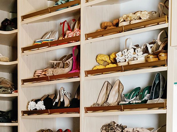 A relevant stock photo of shoe rack custom in a typical setting.