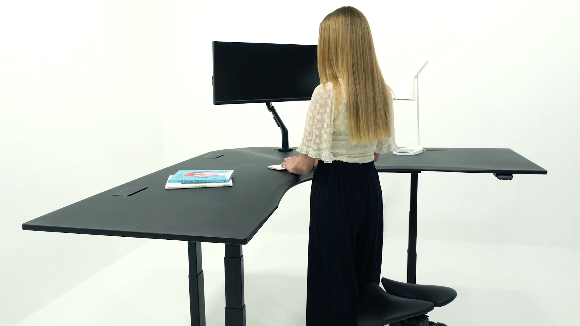 A relevant stock photo of standing desk manufacturer in a typical setting.